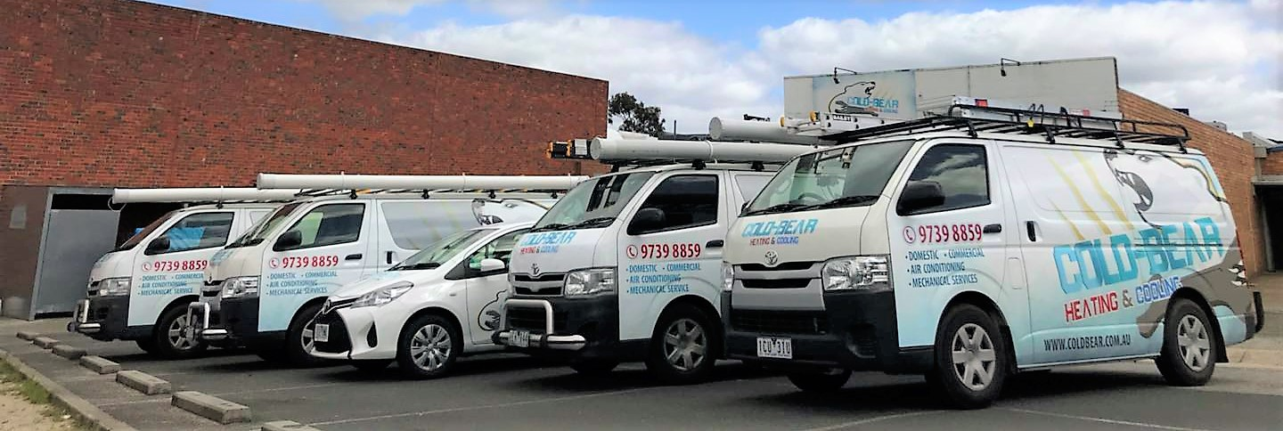 The Cold Bear Heating & Cooling fleet of service vans