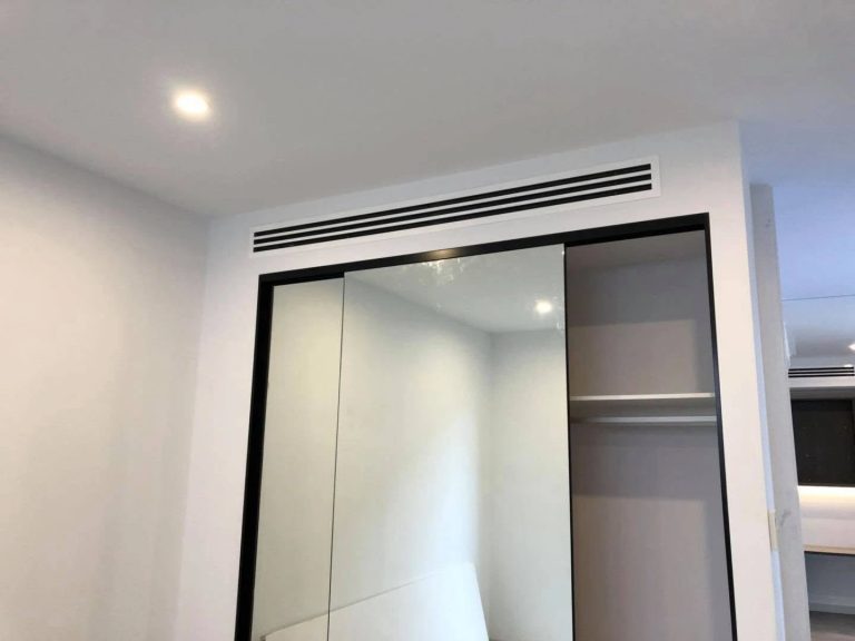 Concealed ducted air conditioning with a flush linear slot diffuser in a designer Melbourne home