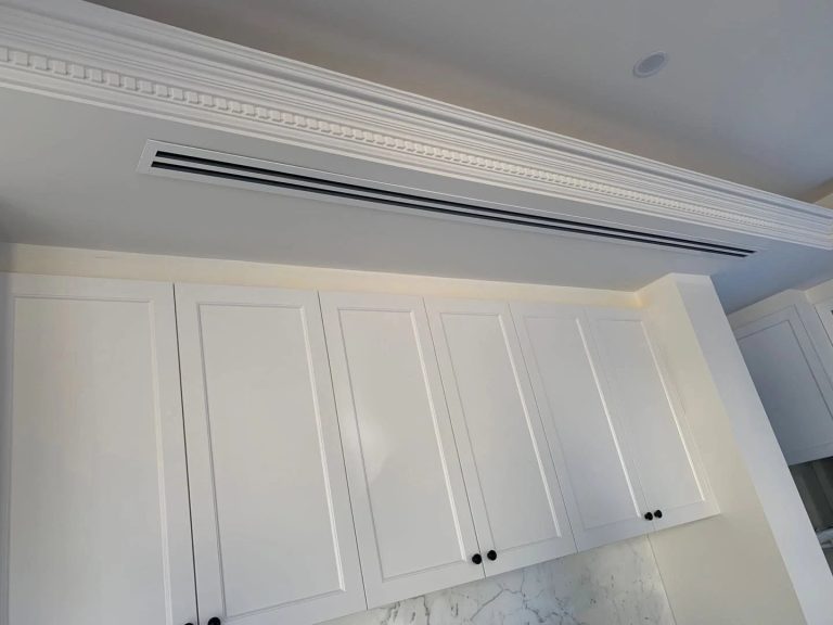 Concealed ducted air conditioning with a flush linear slot diffuser in a designer Melbourne home