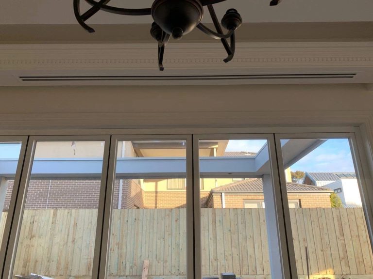 Concealed ducted air conditioning with a flush linear slot diffuser in a designer Melbourne home