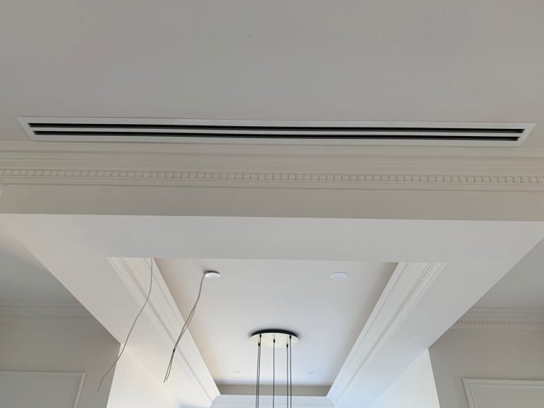 Concealed ducted air conditioning with a flush linear slot diffuser in a designer Melbourne home