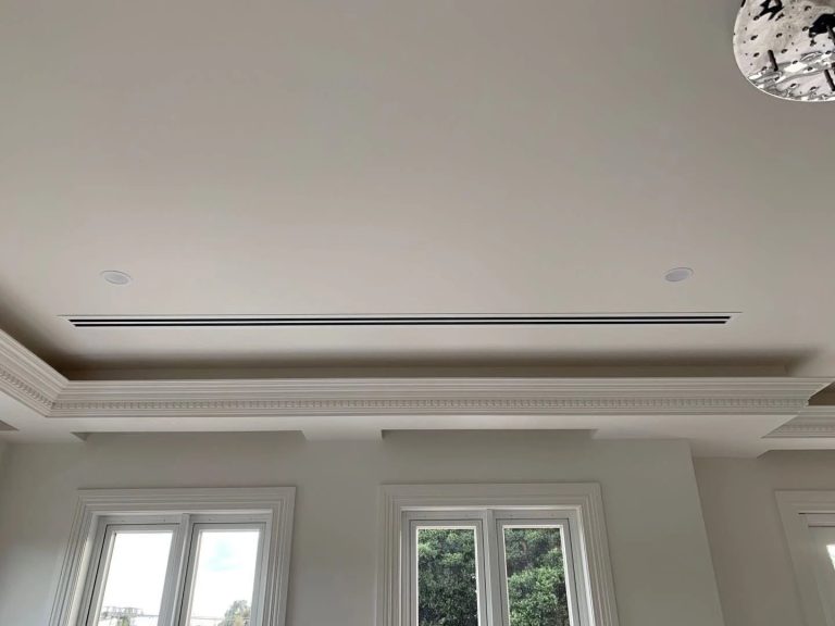 Concealed ducted air conditioning with a flush linear slot diffuser in a designer Melbourne home